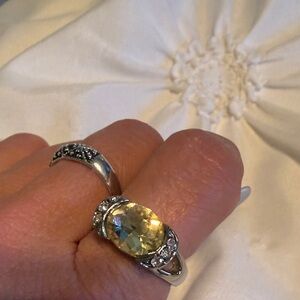 Elegant Silver and Yellow Gemstone Ring